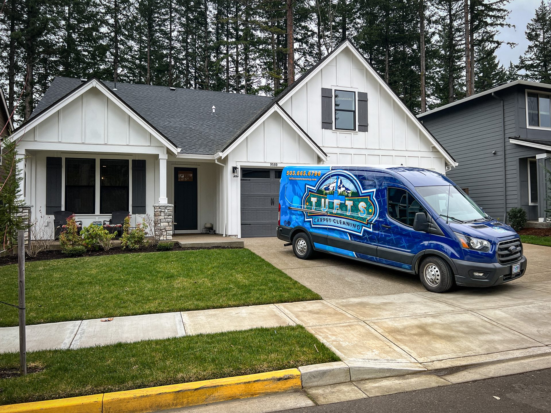 Tufts Carpet Cleaning professional service van arriving at customer home